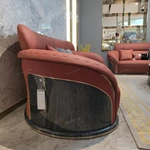 Curved Terracotta Leather Sofa and Blue Accent Chair Set with High-Gloss Wood Details